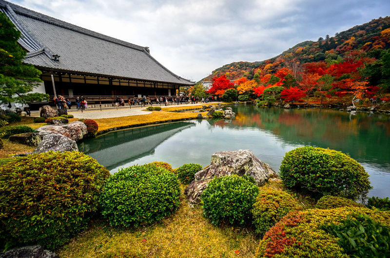 Arashiyama Tour with Optional Sagano Romantic Train Ride - Crossing Togetsukyo Bridge to the river park