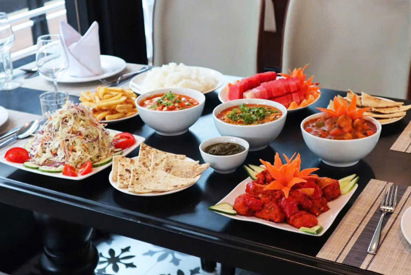 Arcady Premium Day Cruise: Ha Long Bay with Sung Sot & Ti Top - Sunset snacks and the ride back