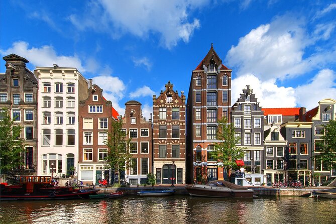 Arrival Transfer From Schiphol Airport AMS to AMSterdam in Private Car/Van - Professional Driver