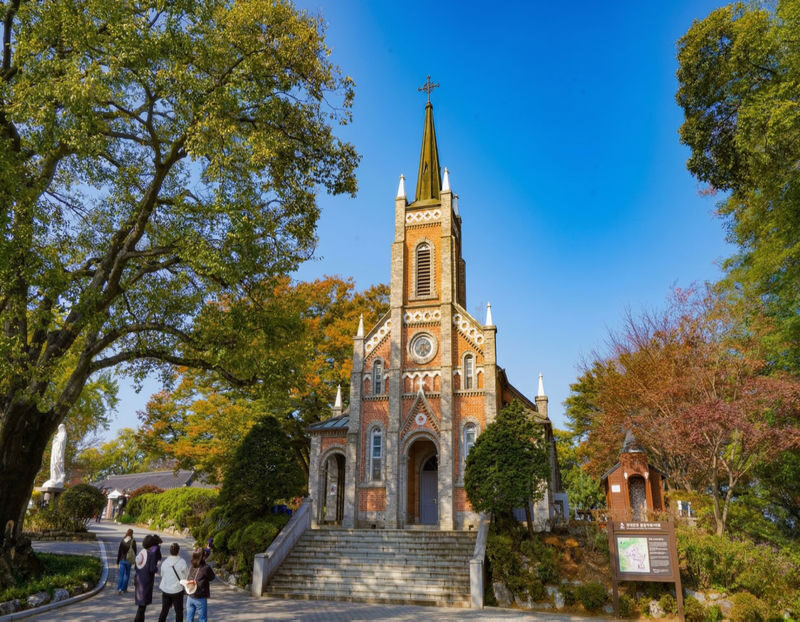 Asan Flower Festival & 500-Year-Old Oeam Folk Village Day tour - Gongseri Church: a photo stop beneath old trees