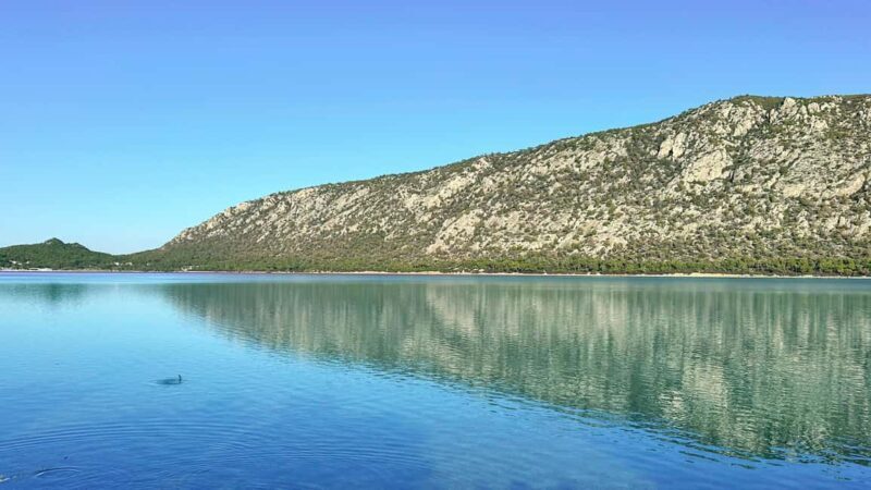 Athens: Lake Vouliagmeni Corinthia, Heraion Sunset & Swim - Lake Vouliagmeni: A Natural Treasure
