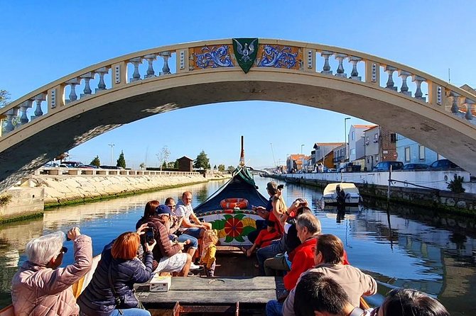 Aveiro and Costa Nova: Private Tour With Moliceiro Cruise Half Day - Visit to Costa Nova Beach