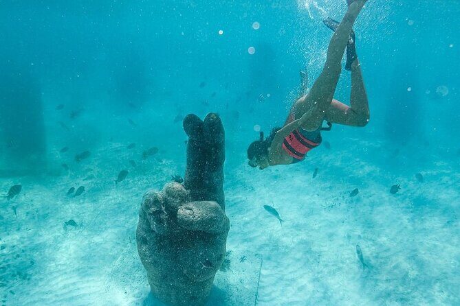 Awesome Catamaran to Isla Mujeres, Snorkeling & Unlimited Drinks! - The Sum Up