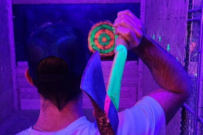 Axe Throwing Las Vegas Neon - What to Expect from VIP Cosmic Axe Throwing
