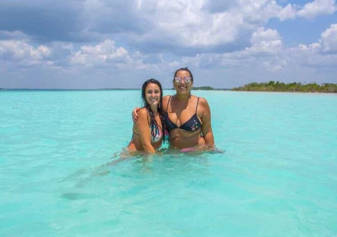 Bacalar: Pontoon Ride, Cenote Azul, Lunch and Transportation - Itinerary Highlights
