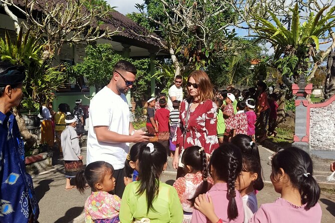 Bali Penglipuran Village, School Visit, Waterfall and Temple Tour - Frequently Asked Questions