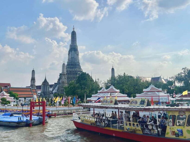 Bangkok: Boat Bliss Riverside Cruise Tour and Wat Arun Visit - Wandering Through Wang Lang Market