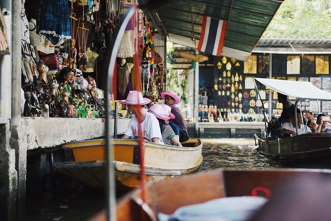 Bangkok Damnoen Saduak Floating Market and Erawan Waterfall (Minimum 2 Pax) - Common Questions
