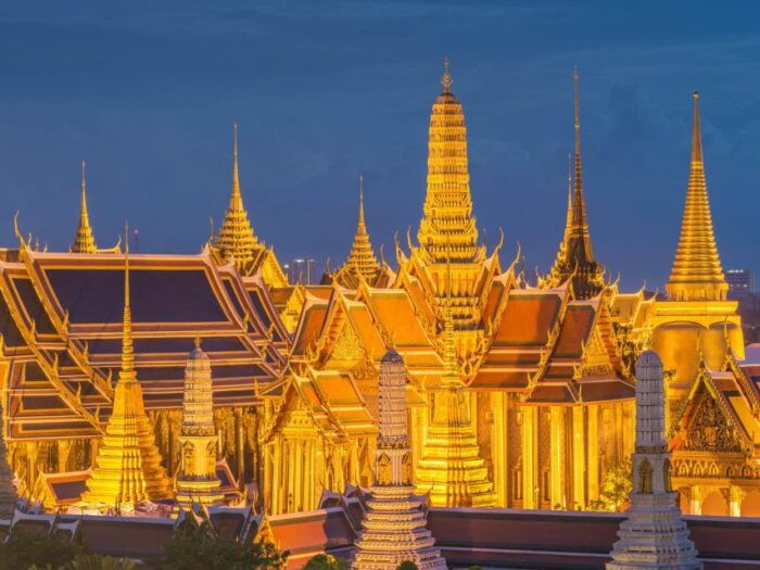 Bangkok: Evening Tour With Wat Arun, Wat Pho & Tuk Tuk Ride - Crossing the River to Admire Wat Arun