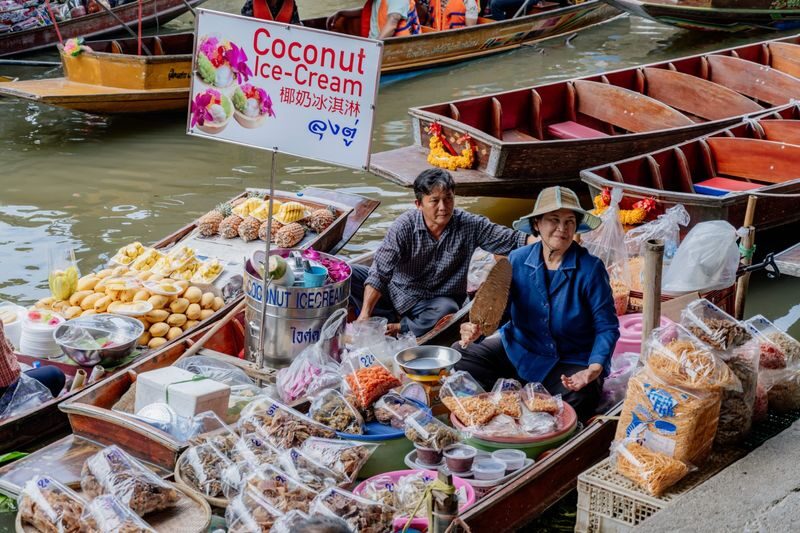Bangkok Floating Markets Day Tour from Siam Paragon by TTD - A coconut sugar house before the markets