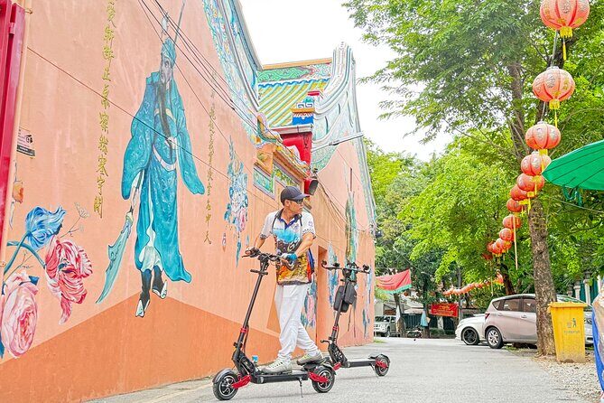 Bangkok: Guided E-Scooter Tour to Temples and Riverside - Exploring Bangkok on a two-wheeled adventure