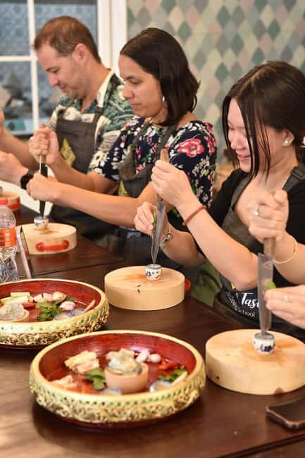 Bangkok: Hands-on Thai Cooking Class & Market Tour in Sathon - Making Curry Paste and Coconut Milk