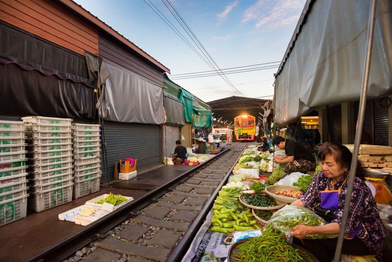 Bangkok Maeklong Railway & Floating Market Half-Day Experience - A floating market seen from the canal