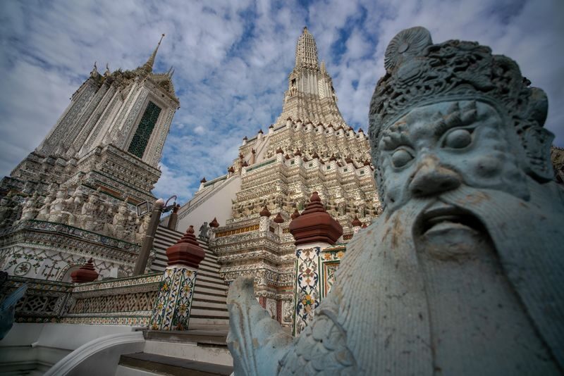 Bangkok Night Tour: Wat Arun, Wat Pho, Chinatown & Tuk Tuk Thrills - Crossing the river to Wat Arun