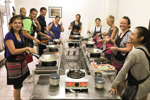 Bangkok: Thai Cooking Class and Onnuch Market Tour - Enjoy a Tasty Meal With Fellow Cooking Students