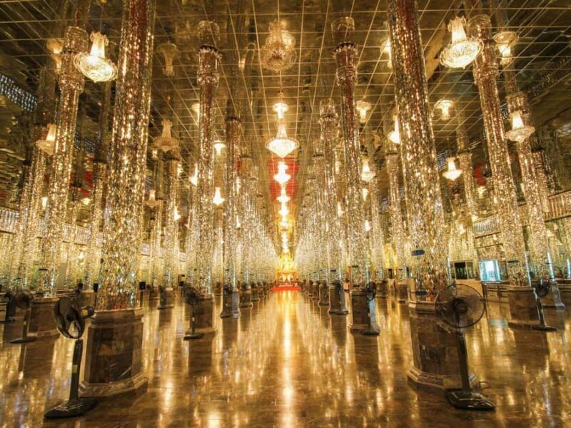 Bangkok: Uthai Thani Day Trip with Floating Temple Visit - Strolling Trok Rong Ya Market