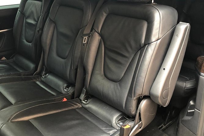 Barcelona Airport (BCN) to Sitges - Round-Trip Private Van Transfer - Bottled Water and WiFi Provided