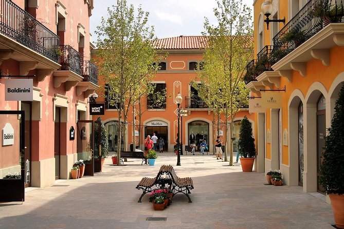 Barcelona and La Roca Village Private Full-Day Tour, Transport - Pickup and End Point