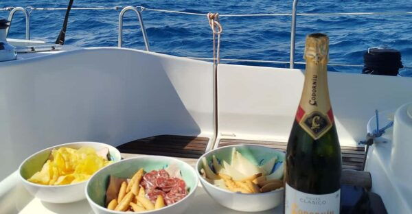 Barcelona Badalona : Sailboat Tour, Snacks, Drinks, Swimming - Coastal Views and Landmark Spotting