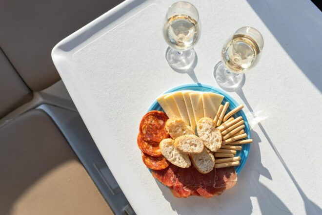 Barcelona: Boat Cruise W/ Swimming, Wine, & Tapas - Itinerary and Experience