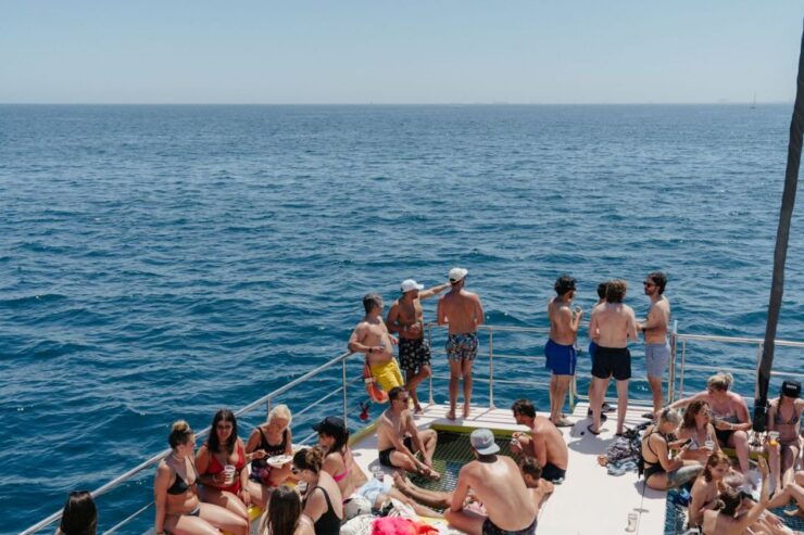 Barcelona: Boat Party With Paella Lunch and Swim - Highlights of the Experience
