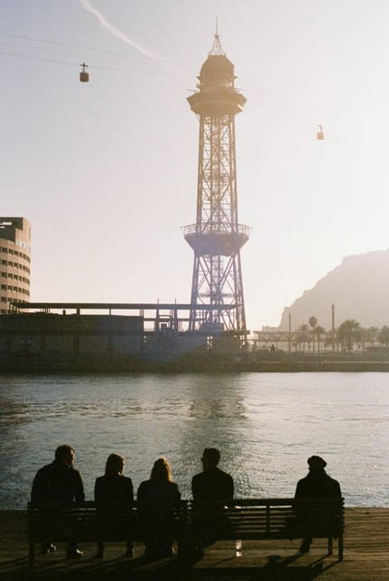Barcelona by Air and Sea: Montjuic, Cable Car, Beach and Catamaran. - Cable Car Crossing: Soaring Over the Harbor
