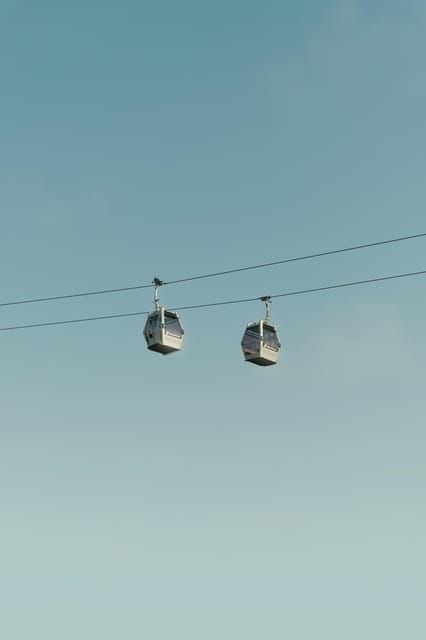 Barcelona by Air and Sea: Montjuic, Cable Car, Beach and Catamaran. - Capturing the Moments