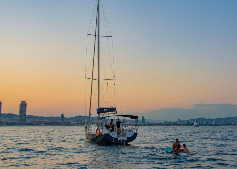 Barcelona: Electric Bike Tour to Montjuic + Relaxing Sailboat Ride - Stroll Through the Historic Gothic Quarter