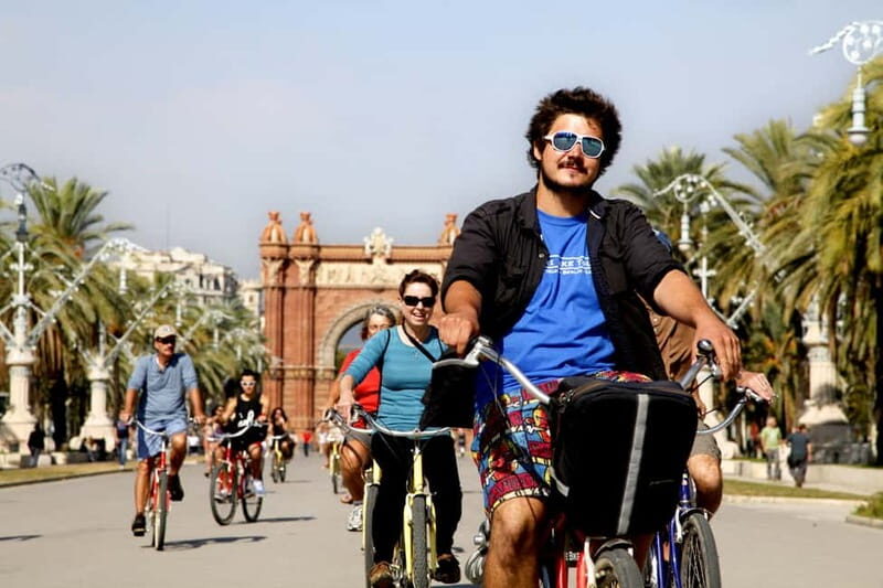 Barcelona: Guided Highlights Bike or eBike Tour (3.5 Hours) - The Beach Stop & Local Tips