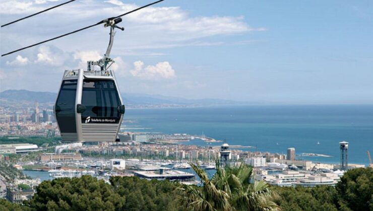 Barcelona: Montjuïc Cable Car Voucher and 2 Audio Tours - Experience Highlights