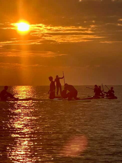 Barcelona: Paddleboarding at Sunrise. Includes: instructor, photos, equipment - Weather and Cancellation