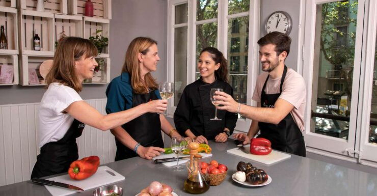 Barcelona: Premium Tapas & Paella Cooking Class - Experience Highlights