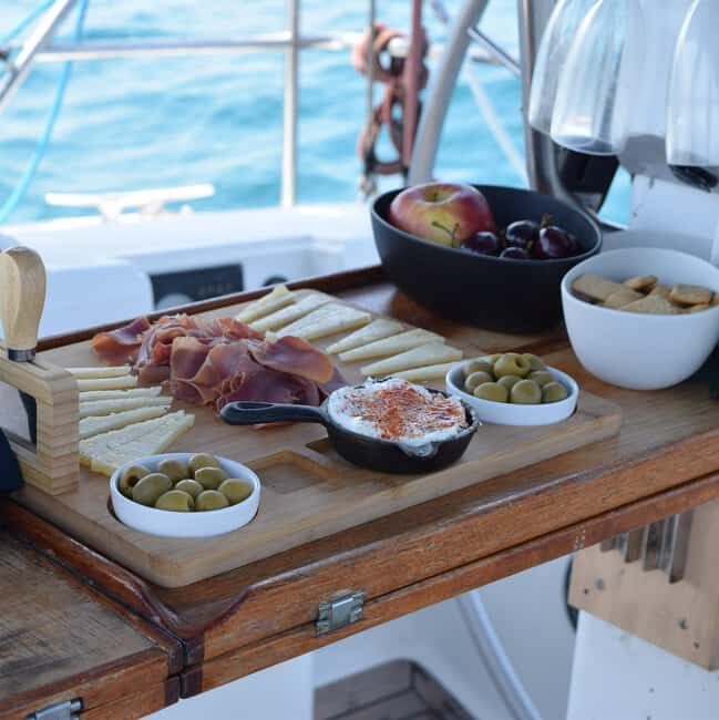 Barcelona: Sailing with Open Bar, Catalan Snack & Swim Stop - In-Depth Breakdown of the Itinerary