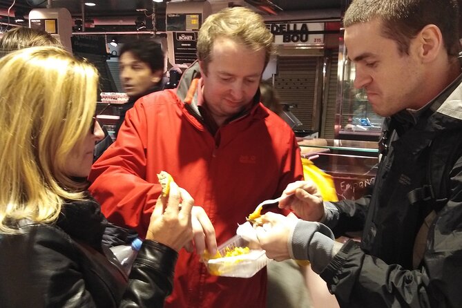 Barcelona Street Food Tour With Local Market & City Center Visit - Must-Try Street Food in Barcelona