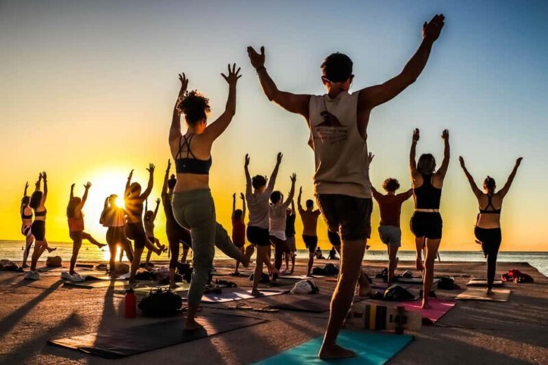Barcelona: Sunrise Yoga by the Sea & Morning Dip - Authentic Reviews Highlighted