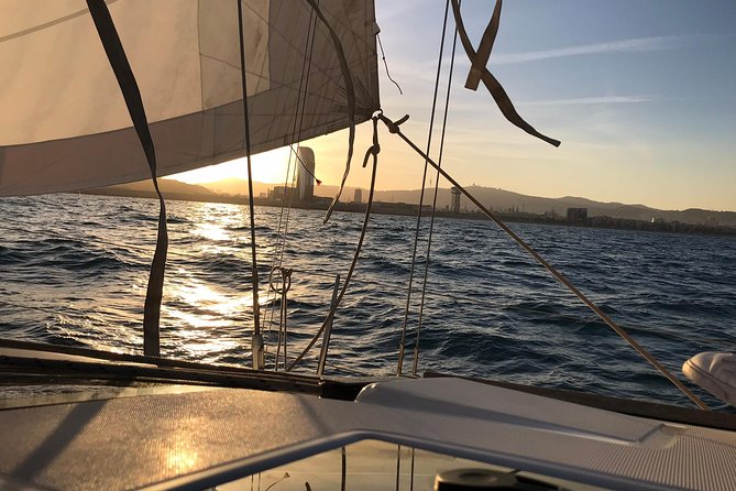 Barcelona Sunset Private Sailing With Light Snacks and Open Bar - Pricing and Copyright Details