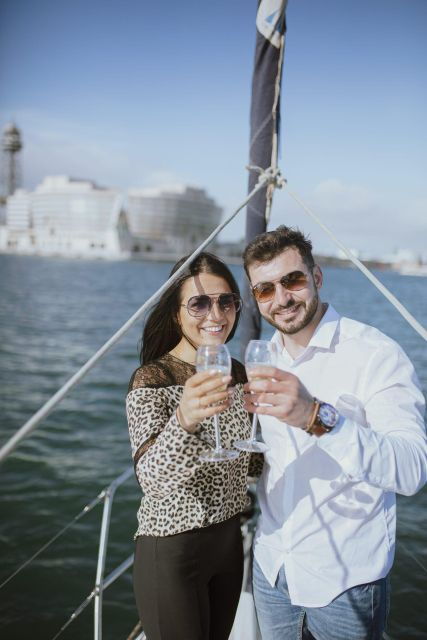 Barcelona: Sunset Sailboat Cruise With Open Bar - Highlights