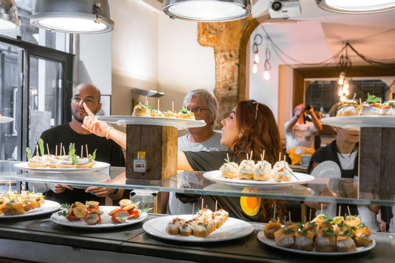 Barcelona Tapas & Drinks Walking Tour in El Born - The Final Table: Paella, Cava, and Dessert
