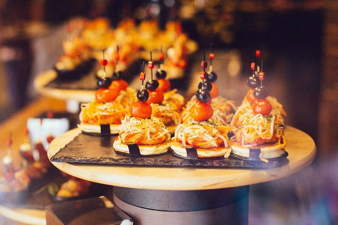 Barcelona With Locals: Wine and Tapas PRIVATE Tour (Bites & Drinks Included) - Immersive Cultural Experience