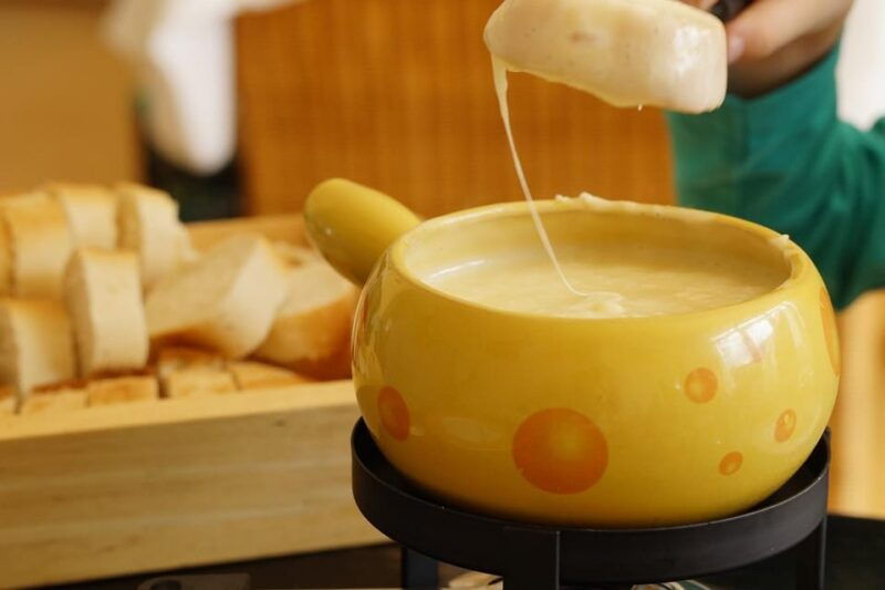 Basel: Cheese Fondue, Wine and Dessert Culinary Experience - Culinary Highlights
