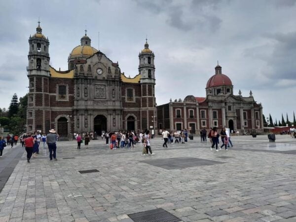 Basilica De Guadalupe: Complete Walking Tour - Walking Through the Plaza