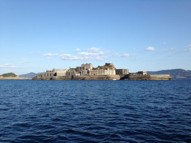 Battleship Island Cruise Experience (Nagasaki) - Hashima’s concrete skyline tells the story