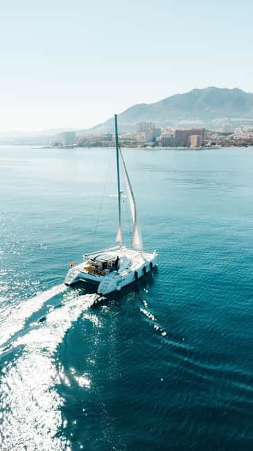 Benalmádena: Sailing & Dolphin Watching with Snacks/Drinks - In Summary