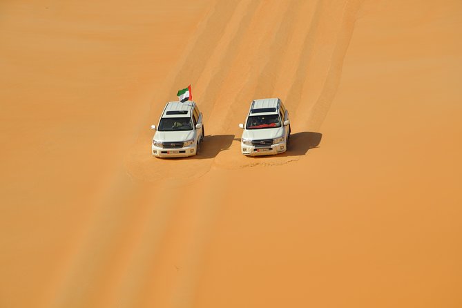 Best Dubai Desert Safari- Quad Biking & Dun Bashing & Sand Boarding With BBQ - The Sum Up