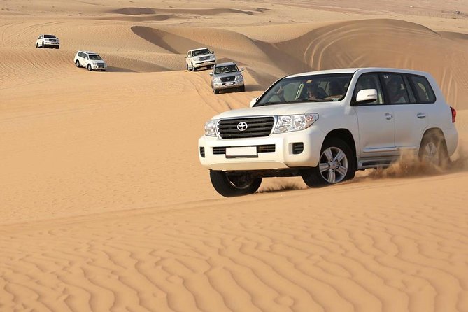 Best Dubai Desert Safari With Buffet Dinner,Sand Boarding & Shows - The Sum Up