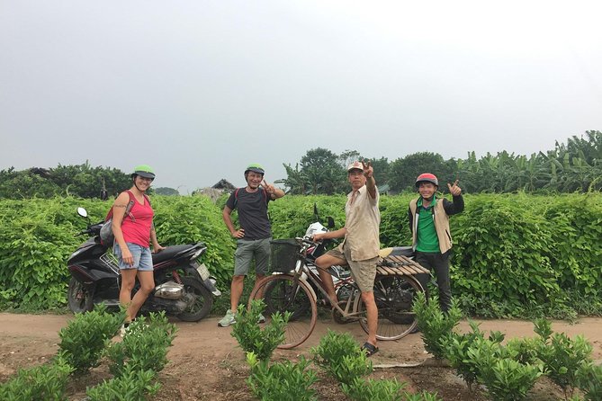 Best Hanoi Motorbike Tour: Local Guide, City Center & Countryside - Language and Guide Details