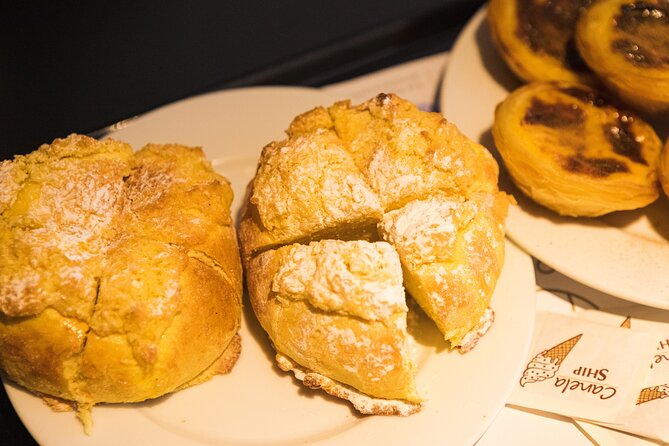 Best of Lisbon Tuk Tuk Food Tour With Eating Europe - Tuk Tuk Ride and Iconic Sights