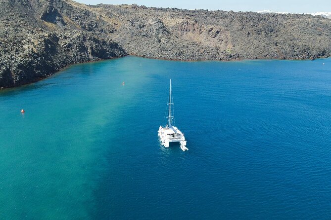 Best of Santorini Private Half-Day Catamaran Cruise With Transfer and Meal - Cancellation Policy