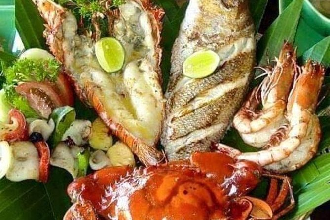 Best Romantic Seafood Dinner at Jimbaran Beach Sunset - Sunset Setting at Jimbaran Beach
