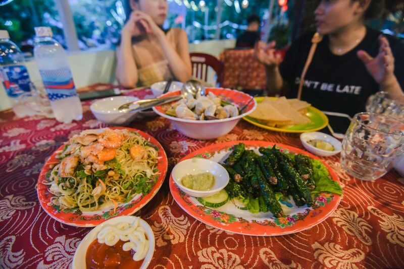 Bike and Bite in Hoi An - Riding through neighborhoods and rice fields